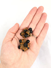 Load image into Gallery viewer, Big Plastic Clip on Earrings ROCHELLE Chrysanthemum Style Earrings in Golden Orange and Black