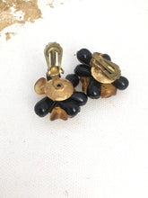 Load image into Gallery viewer, Big Plastic Clip on Earrings ROCHELLE Chrysanthemum Style Earrings in Golden Orange and Black