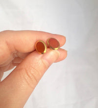 Load image into Gallery viewer, Small Orange Glass Stud Earrings Gold Rimmed Orange Vintage Glass Cabochon Earrings, Oval Glass Studs with golden rims, Mod Earrings Posts